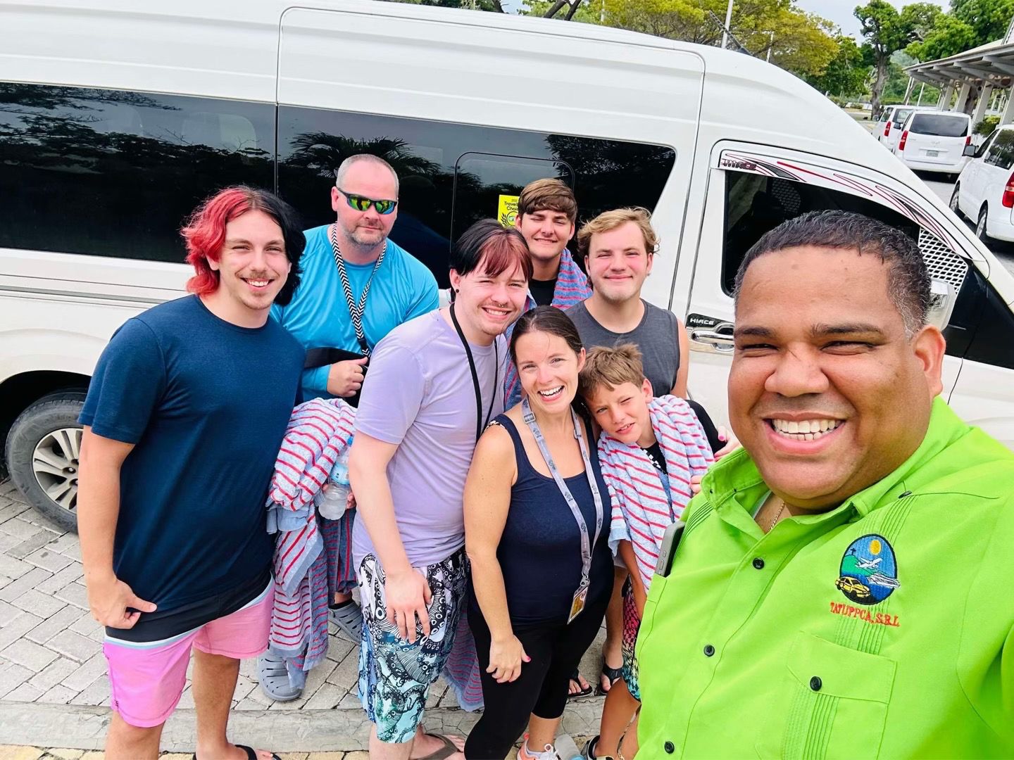 Founder of POP Dominican Travel with happy guests